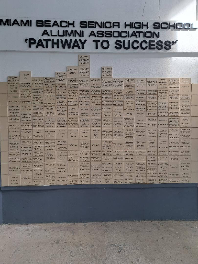 Close-up of commemorative engraved bricks on the Pathway to Success wall