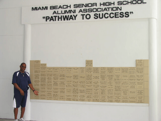 Pathway to Success wall — Phase One installation with Coach Al Booker (class of '71) standing at left